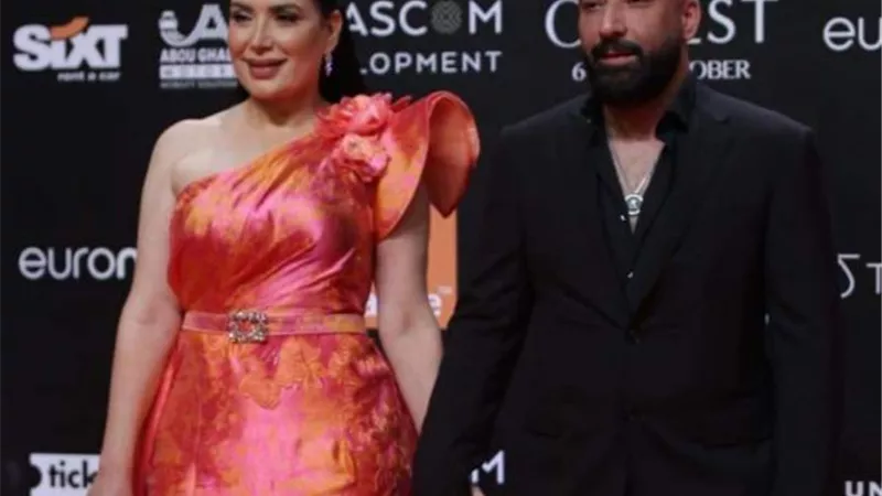 بالصور.. عبير صبرى وزوجها أيمن البياع يشعلان ”ريد كاربت” الجونة السينمائى