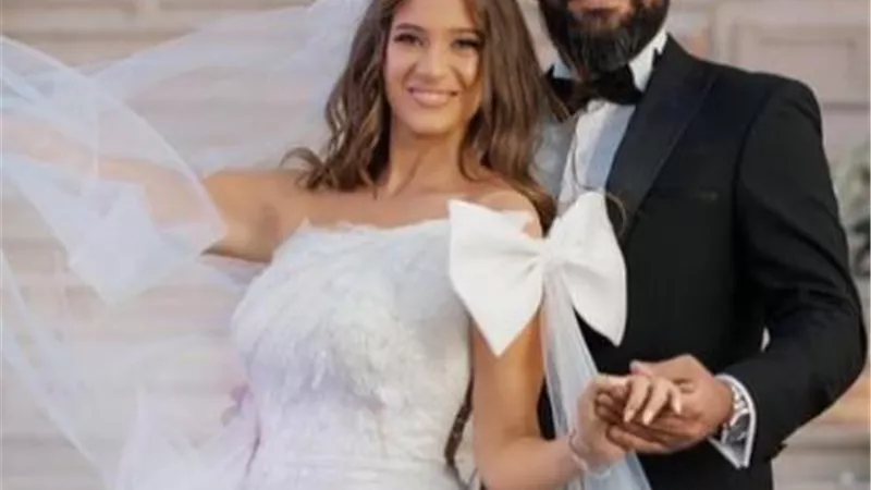 شاهد.. خالد عليش وزوجته فى أول ظهور من شهر العسل
