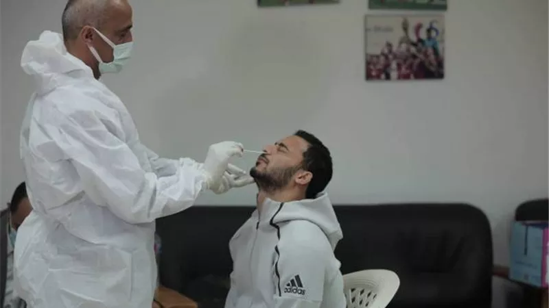 مسحة طبية لبعثة الأهلي بعد الوصول إلى قطر
