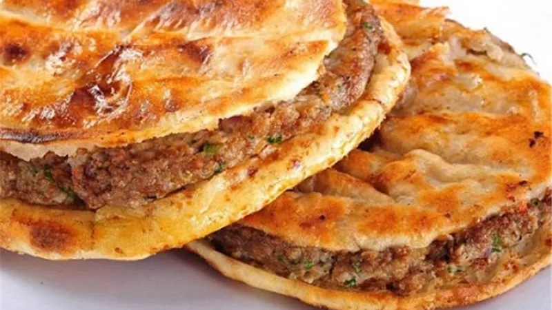 «زي المطاعم».. أسهل طريقة لتحضير حواوشي الفراخ