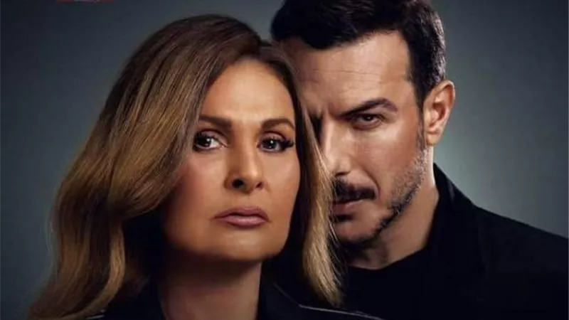 يسرا وباسل خياط يتصدران البوستر الرسمي لمسلسل ”حرب أهلية”